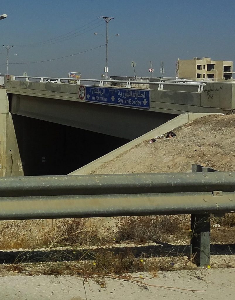 Highway sign for the Syrian border, just 30 minutes away.